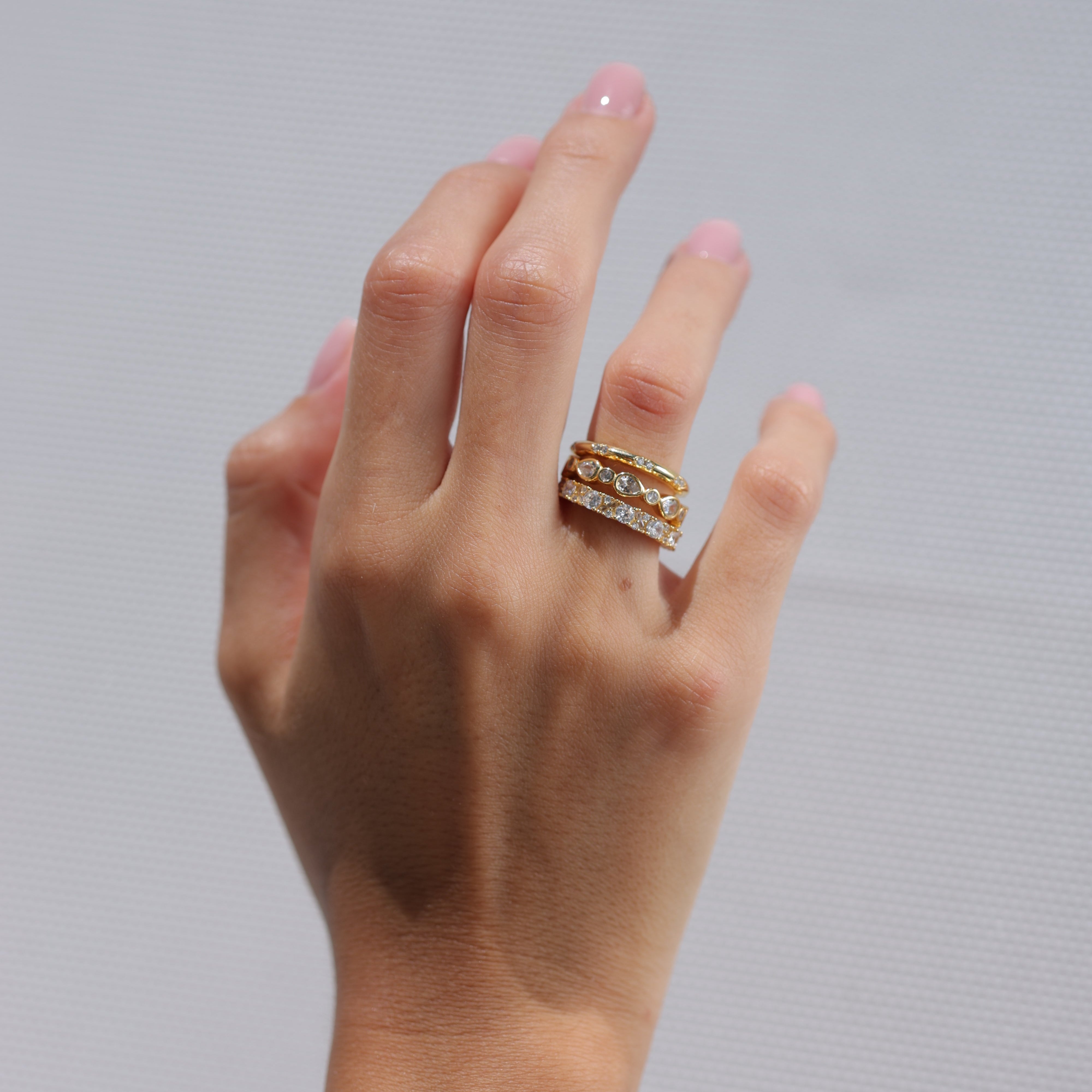 Stackable sterling silver bands designed for everyday wear gold plated